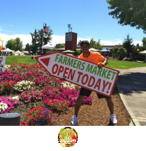 Sign Spinners in Fife WA Farmers Market